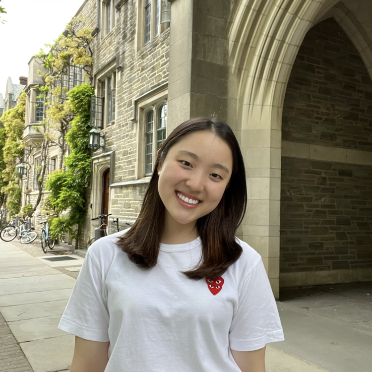 Dyanne standing on Princeton's campus